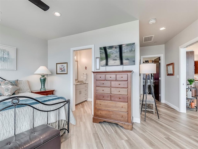 bedroom with baseboards, light wood-style floors, visible vents, and recessed lighting
