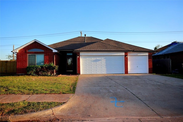 ranch-style house featuring a garage, fence, a front lawn, and brick siding