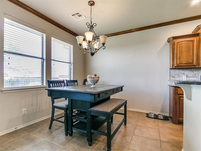 3515 Homesteaders Ln, Guthrie, OK 73044 - dining space with crown molding, a chandelier, light tile patterned floors, baseboards, and visible vents