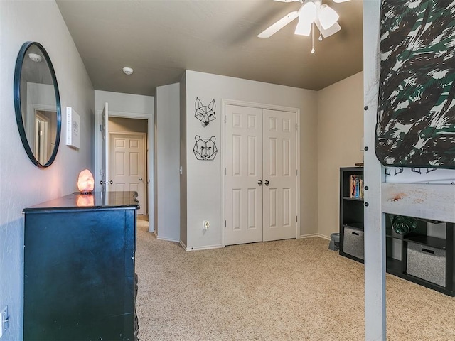 3515 Homesteaders Ln, Guthrie, OK 73044 - carpeted bedroom featuring baseboards, a closet, and ceiling fan