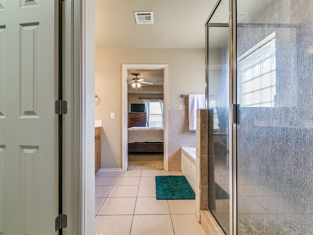 3515 Homesteaders Ln, Guthrie, OK 73044 - ensuite bathroom featuring visible vents, tile patterned floors, a stall shower, and ensuite bathroom