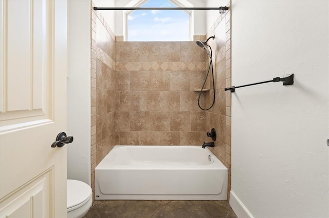 full bathroom featuring toilet and  shower combination