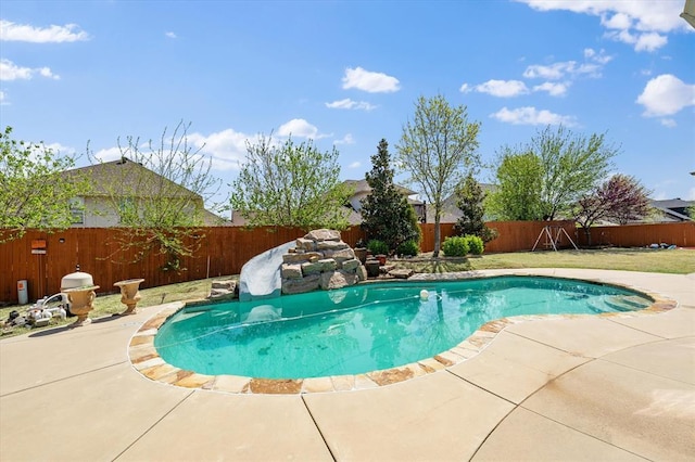 view of pool with a fenced backyard, a patio, and a fenced in pool
