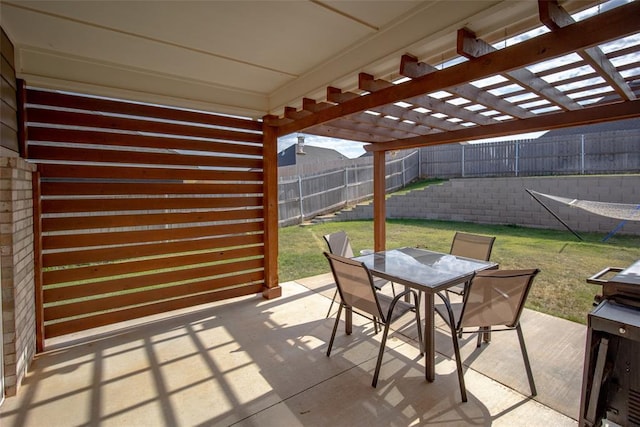 view of patio featuring a fenced backyard, a pergola, and outdoor dining space