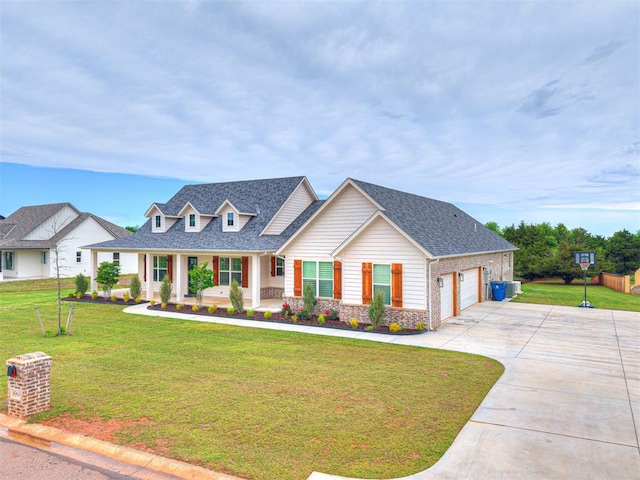 view of front of house featuring a porch, roof with shingles, a front lawn, concrete driveway, and an attached garage
