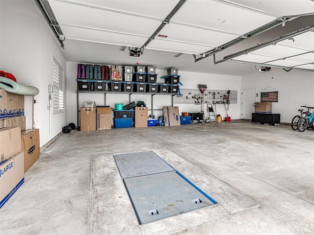 garage featuring a garage door opener