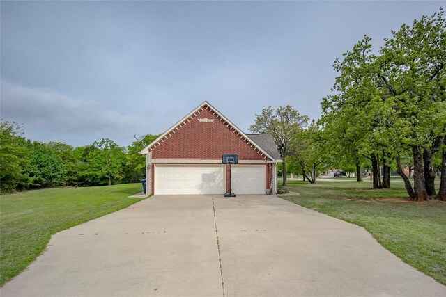 2400 Whiteoak Dr, Blanchard, OK 73010 - view of side of home featuring brick siding, a yard, and driveway