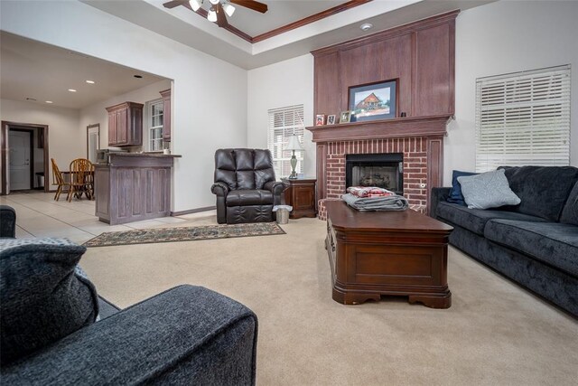 2400 Whiteoak Dr, Blanchard, OK 73010 - living area with ceiling fan, light carpet, a raised ceiling, a fireplace, and recessed lighting