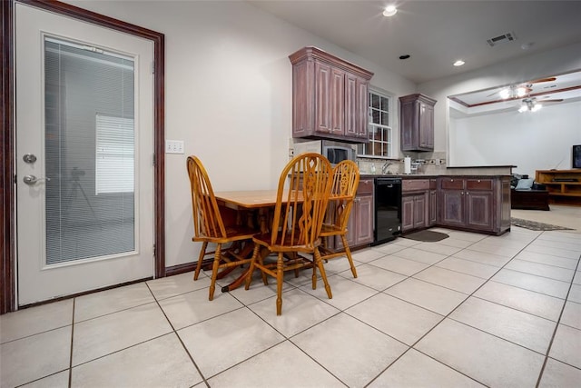 2400 Whiteoak Dr, Blanchard, OK 73010 - kitchen featuring a peninsula, dark countertops, visible vents, recessed lighting, and light tile patterned floors
