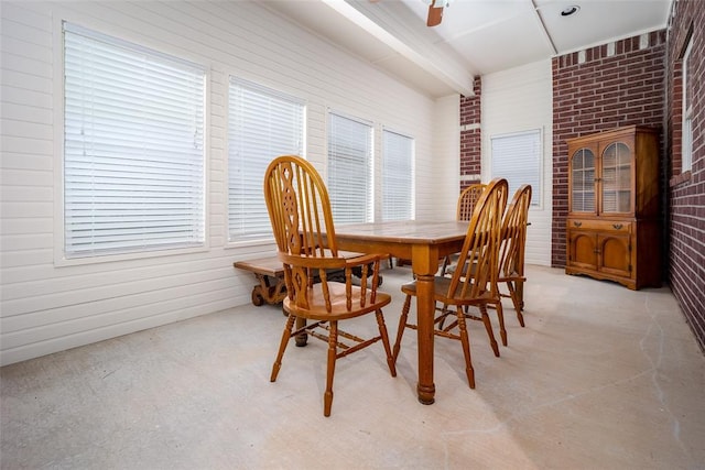 2400 Whiteoak Dr, Blanchard, OK 73010 - dining room featuring ceiling fan and brick wall