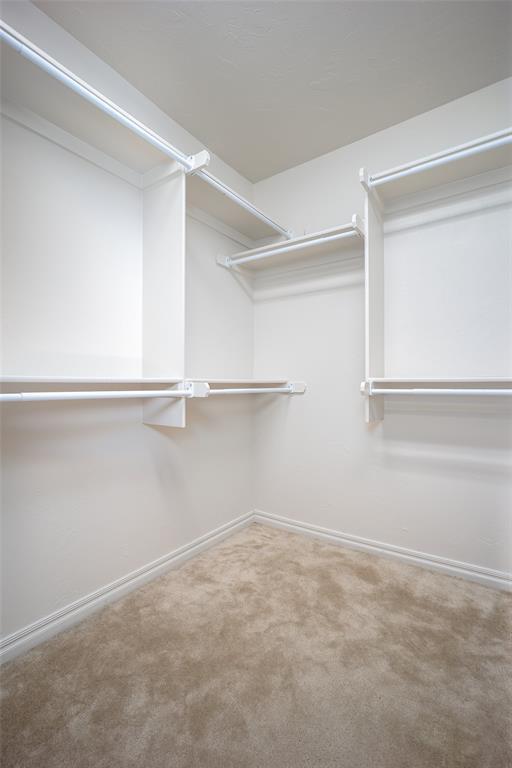 2400 Whiteoak Dr, Blanchard, OK 73010 - walk in closet featuring carpet floors