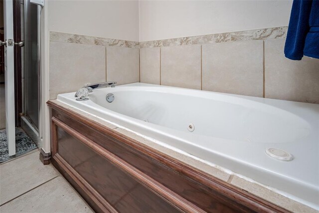 2400 Whiteoak Dr, Blanchard, OK 73010 - full bathroom featuring tile patterned floors, a whirlpool tub, and a stall shower