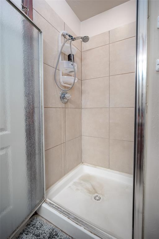 2400 Whiteoak Dr, Blanchard, OK 73010 - full bathroom with a stall shower