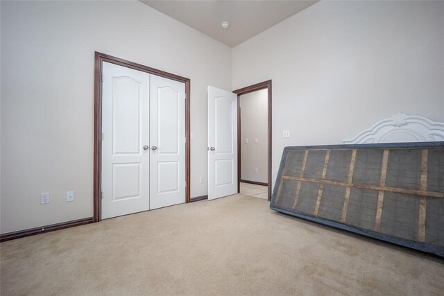2400 Whiteoak Dr, Blanchard, OK 73010 - unfurnished bedroom with baseboards, carpet floors, and a closet