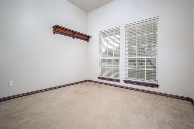 2400 Whiteoak Dr, Blanchard, OK 73010 - spare room with baseboards and carpet flooring
