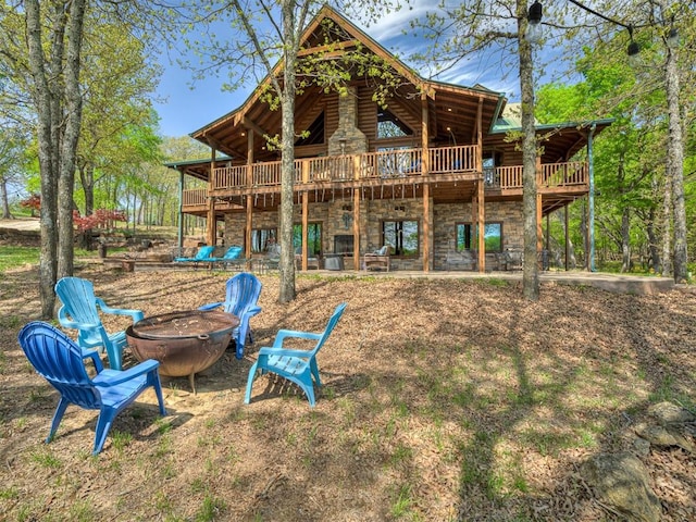 2010 Shady Cv, Sulphur, OK 73086 - view of jungle gym with a wooden deck and an outdoor fire pit