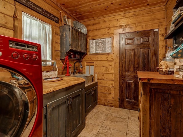 2010 Shady Cv, Sulphur, OK 73086 - clothes washing area featuring wood ceiling, wood walls, laundry area, and washer / dryer