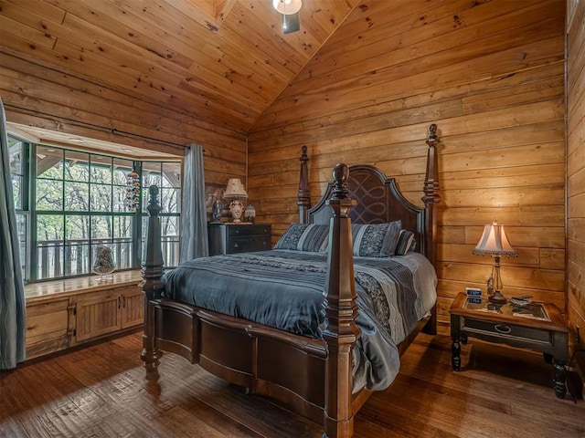 2010 Shady Cv, Sulphur, OK 73086 - bedroom with lofted ceiling, wood walls, and dark wood-type flooring
