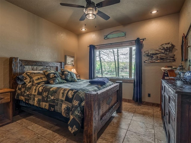 2010 Shady Cv, Sulphur, OK 73086 - bedroom featuring a textured wall, a textured ceiling, and ceiling fan