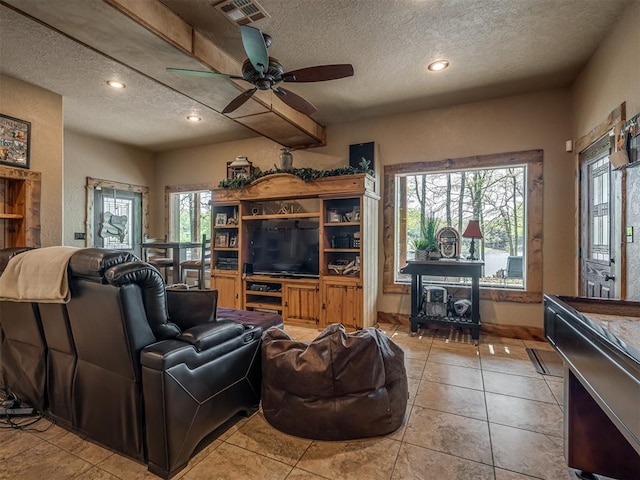 2010 Shady Cv, Sulphur, OK 73086 - living room featuring visible vents, a textured ceiling, recessed lighting, and ceiling fan