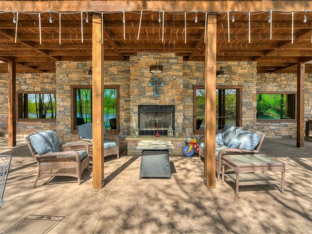 2010 Shady Cv, Sulphur, OK 73086 - view of patio featuring an outdoor living space with a fireplace