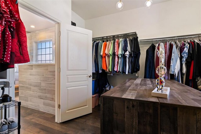 2201 Pine View Ter, Edmond, OK 73003 - walk in closet with dark wood-type flooring