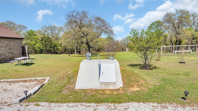 130 Quail Dr, Healdton, OK 73438 - view of storm shelter with a lawn