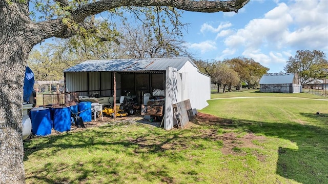 130 Quail Dr, Healdton, OK 73438 - view of pole building with a yard and a detached carport