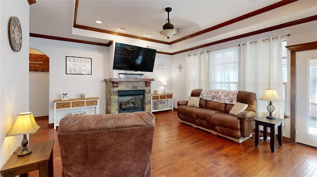 130 Quail Dr, Healdton, OK 73438 - living room with hardwood / wood-style flooring, crown molding, and a raised ceiling