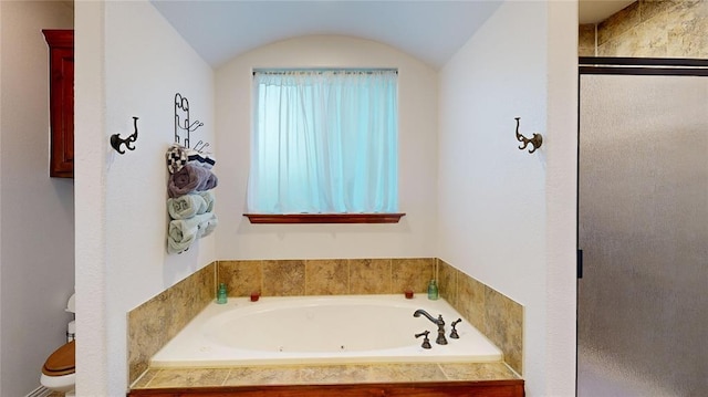 130 Quail Dr, Healdton, OK 73438 - bathroom with a shower stall, a garden tub, and lofted ceiling