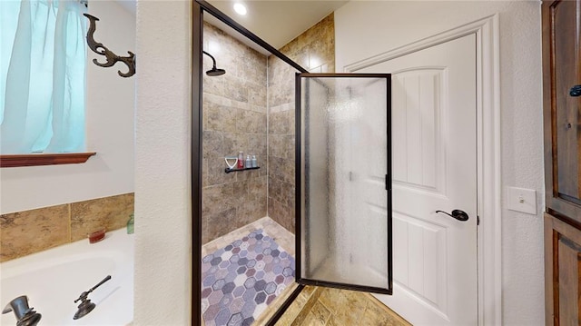 130 Quail Dr, Healdton, OK 73438 - full bath with a garden tub and a stall shower