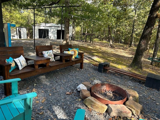 30953 State Hwy Unit 144, Smithville, OK 74957 - view of yard featuring an outdoor fire pit