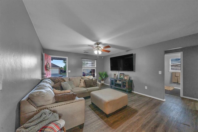 7909 Chumley Ln, Oklahoma City, OK 73135 - living room featuring a ceiling fan, baseboards, and wood finished floors