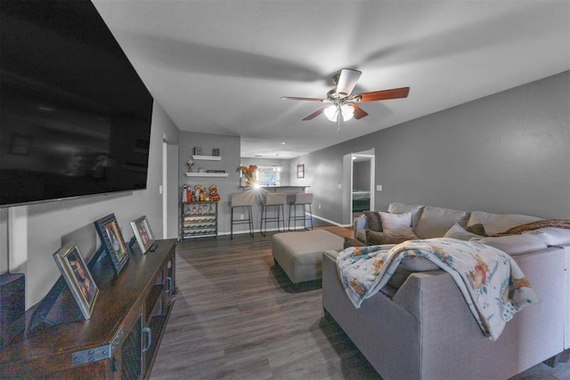 7909 Chumley Ln, Oklahoma City, OK 73135 - living area with a ceiling fan, baseboards, and wood finished floors