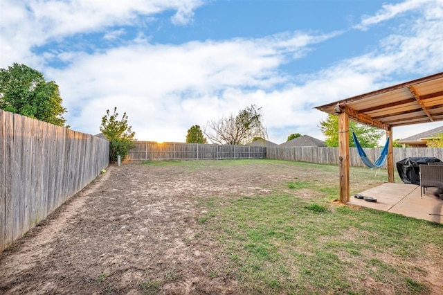 7909 Chumley Ln, Oklahoma City, OK 73135 - view of yard featuring a fenced backyard and a patio