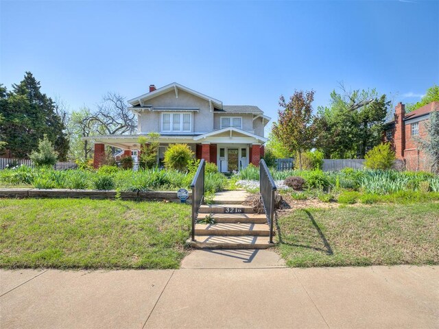 3216 NW 19th St, Oklahoma City, OK 73107 - view of front of house featuring fence and stucco siding