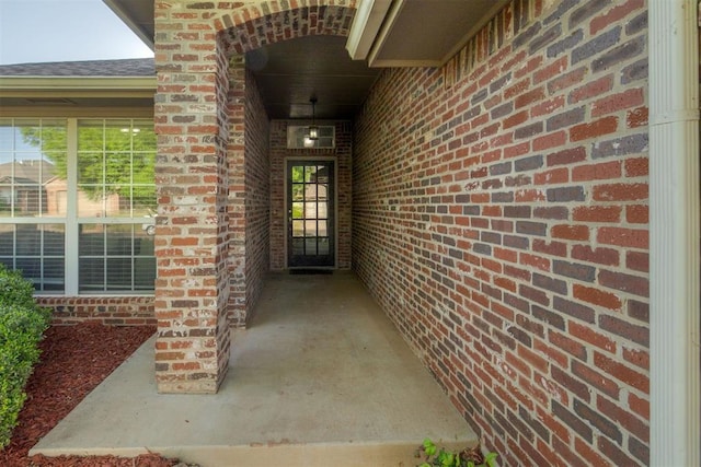 15924 Sky Run Dr, Edmond, OK 73013 - view of exterior entry featuring brick siding