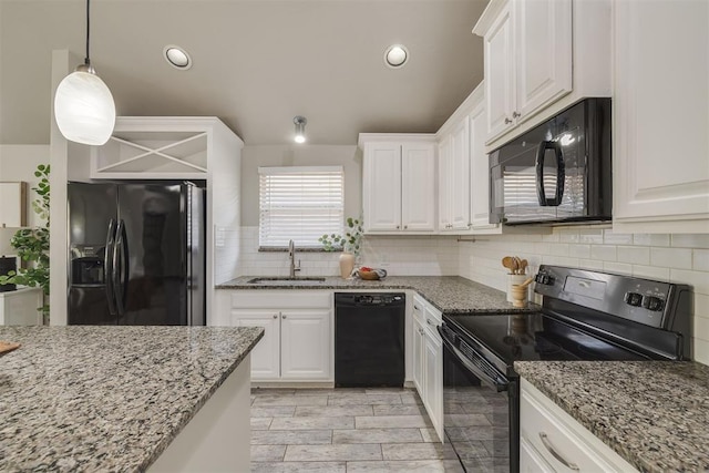 15924 Sky Run Dr, Edmond, OK 73013 - kitchen featuring a sink, tasteful backsplash, black appliances, and white cabinetry