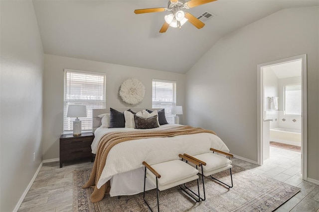 15924 Sky Run Dr, Edmond, OK 73013 - bedroom with visible vents, lofted ceiling, light wood-style floors, connected bathroom, and a ceiling fan