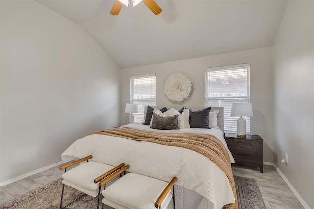 15924 Sky Run Dr, Edmond, OK 73013 - bedroom featuring light wood-style floors, a ceiling fan, baseboards, and lofted ceiling
