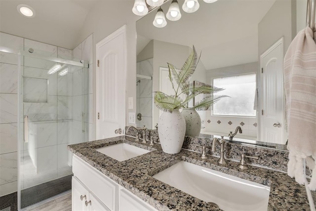15924 Sky Run Dr, Edmond, OK 73013 - bathroom featuring a sink, a stall shower, and lofted ceiling