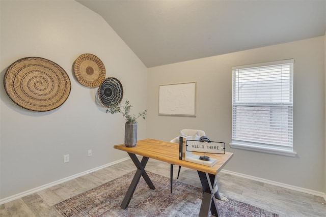 15924 Sky Run Dr, Edmond, OK 73013 - office area with baseboards, vaulted ceiling, and light wood-style floors