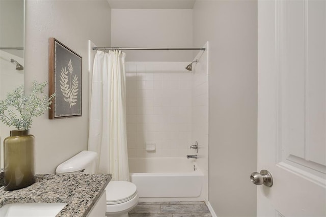 15924 Sky Run Dr, Edmond, OK 73013 - bathroom with vanity, shower / bath combo with shower curtain, toilet, and wood finished floors