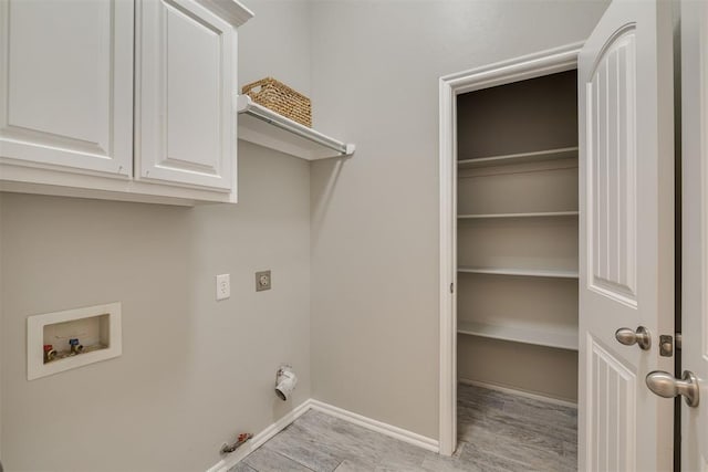 15924 Sky Run Dr, Edmond, OK 73013 - washroom with hookup for a washing machine, hookup for a gas dryer, baseboards, light wood-type flooring, and hookup for an electric dryer