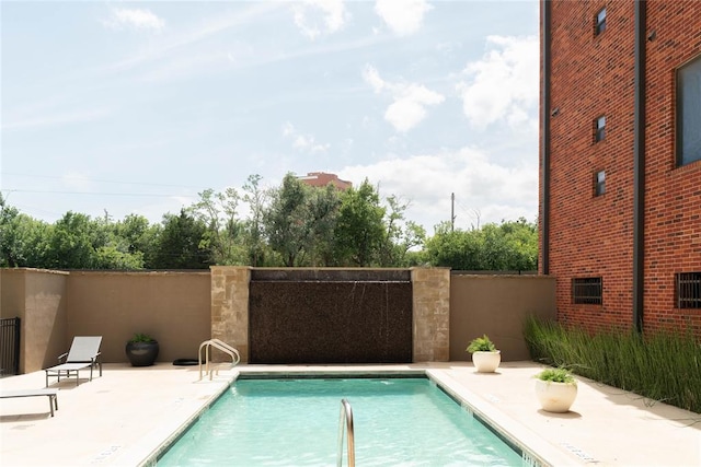 401 E Boyd St Unit 205, Norman, OK 73069 - community pool featuring a patio area