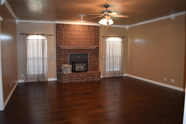 2297 Barrington Dr, Blanchard, OK 73010 - unfurnished living room featuring baseboards, wood finished floors, ceiling fan, crown molding, and a wood stove