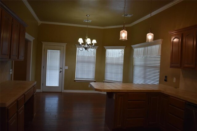 2297 Barrington Dr, Blanchard, OK 73010 - kitchen with dishwasher, baseboards, a peninsula, dark wood-type flooring, and visible vents