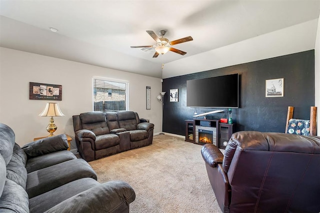1105 NW 3rd St, Newcastle, OK 73065 - living area featuring ceiling fan, carpet, baseboards, and a glass covered fireplace