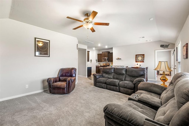 1105 NW 3rd St, Newcastle, OK 73065 - living room featuring a ceiling fan, baseboards, visible vents, vaulted ceiling, and light colored carpet