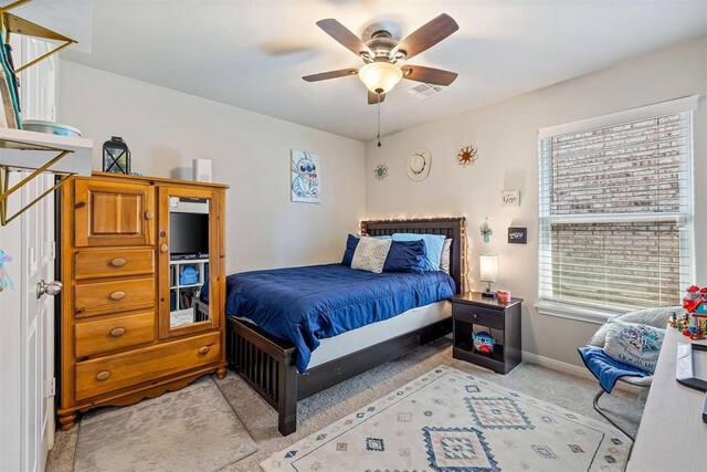 1105 NW 3rd St, Newcastle, OK 73065 - bedroom featuring light colored carpet, baseboards, ceiling fan, and visible vents